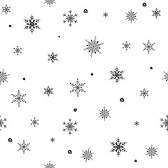 Seamless pattern of snowflakes on a white background