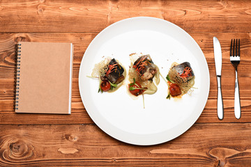 dish of fish on plate