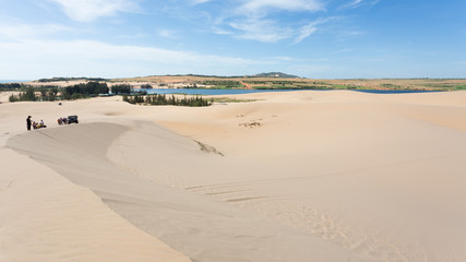 off road car vehicle in white sand dune desert at Mui Ne