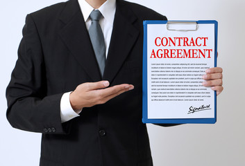 man showing a written contract agreement