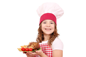 happy little girl cook with roasted chicken wings franch fries a