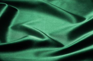 Green satin fabric as background