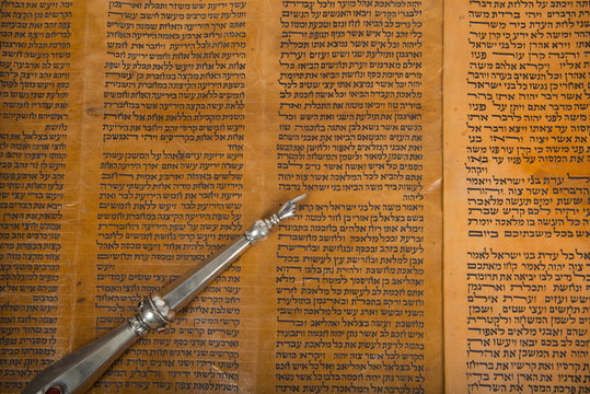 an ancient torah scroll close up