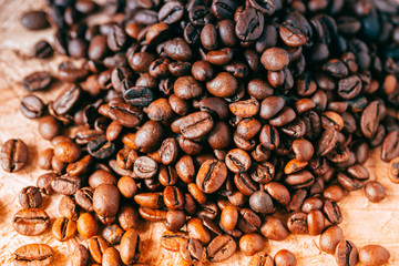 Closeup of coffee beans with focus on one