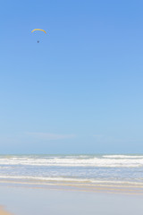 Paraglider in Torres beach