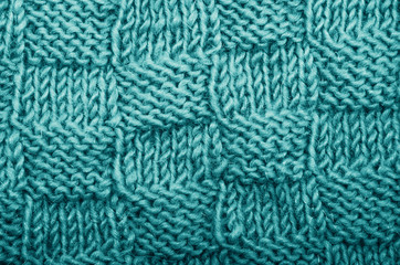 Detail of woven handicraft knit woolen design texture.