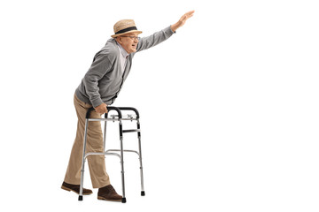 Elderly man with a walker waving