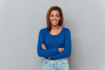 African woman in sweater isolated