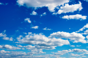 White clouds in blue sky.