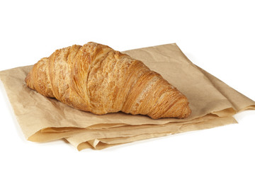 Fresh croissant on white background