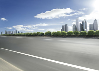 Obraz premium Motion blurred racetrack view on empty road asphalt