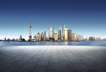 shanghai skyline panoramic view at dusk with stone stage,China