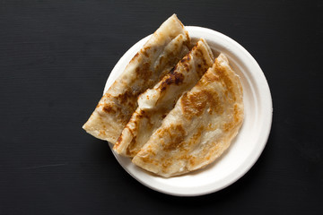 Roti Top view on black background