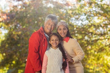 Happy multi-generation family at park