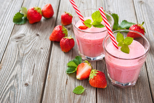 Two glasses of strawberry smoothie