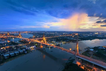 Foto op Plexiglas Bangkok City - Beautiful sunset view of Bhumibol Bridge in Bangkok , Bridge of transportation for import , export , Bangkok ,Thailand © weerasak