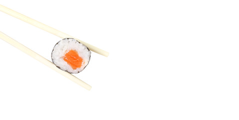 Chopsticks holding sushi isolated on white - Copyspace