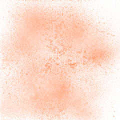 Orange pastel spray paint on white background