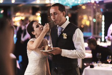 Stylish happy bride and groom