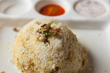 veg biryani or biriyani or pulao made of basmati rice. hot spicy food very popular in Hyderabad India