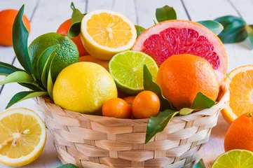 Fotobehang Various citrus fruits (orange, grapeftuit, lemon, mandarine, lime) © Maresol