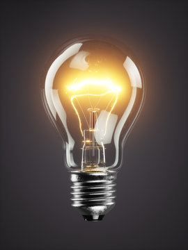 Low glowing electric bulb lamp on dark background