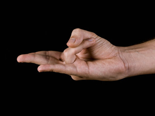 Close-up of a hand, practicing yoga, Surya mudra