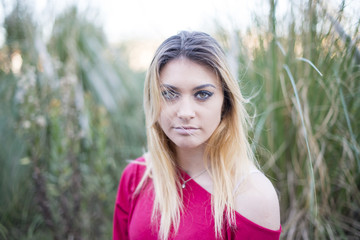 Young girl portrait on the field.