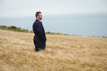 Farmer standing in the field