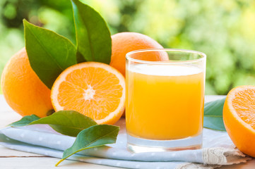 Fresh orange juice with oranges