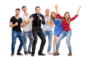Obraz premium It's party time! Group of happy smiling friends with bottles of beer having fun together. Isolated on white.