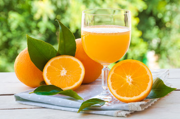 Fresh orange juice with oranges