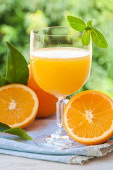 Fresh orange juice with oranges