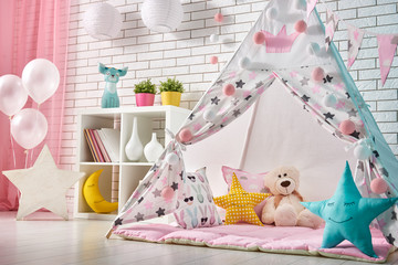 children room with play tent