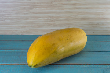 papaya on wood background