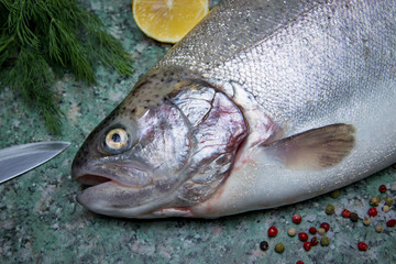 Raw  trout and lemons.