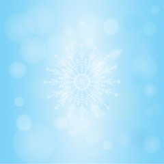 Winter bokeh abstract light background with snowflakes.