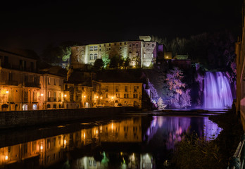 Isola del Liri waterfall and castle by night, Ciociaria, Italy