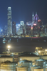 Fototapeta na wymiar Oil tank in Victoria harbor of Hong Kong city at night