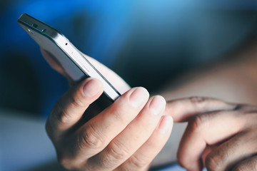 Man hands using a smartphone.
