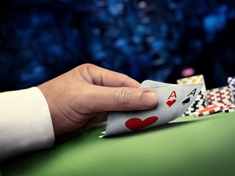 online poker player at casino table