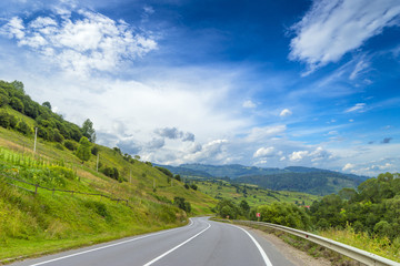 Road and mountain, summer time in country side