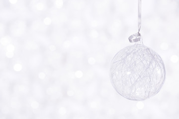 Beautiful shiny ball on a winter background