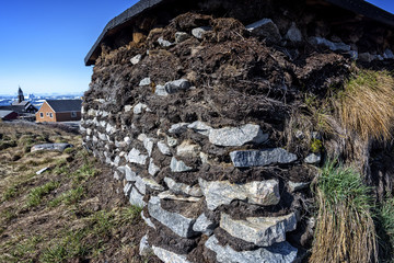 Iceberg on arctic ocean against sky