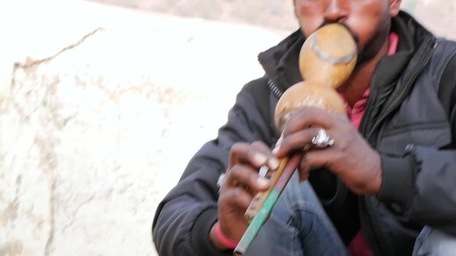 Snake charmer at the street of Jaipur, India