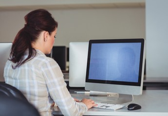 Mature student using computer