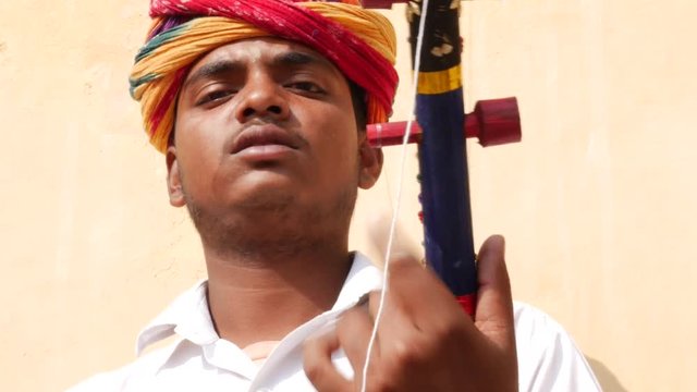 Musician Playing Traditional Rajasthani Music On The Street Of Jaipur, Rajasthan, India