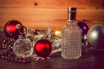 Obraz na płótnie Canvas perfume and Christmas decorations