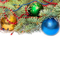 Christmas background. Branch of fir with christmas toys and garl