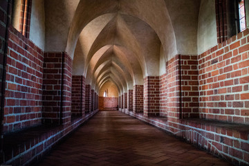 Long empty corridor in the medieval castle, Malbork, October 2015